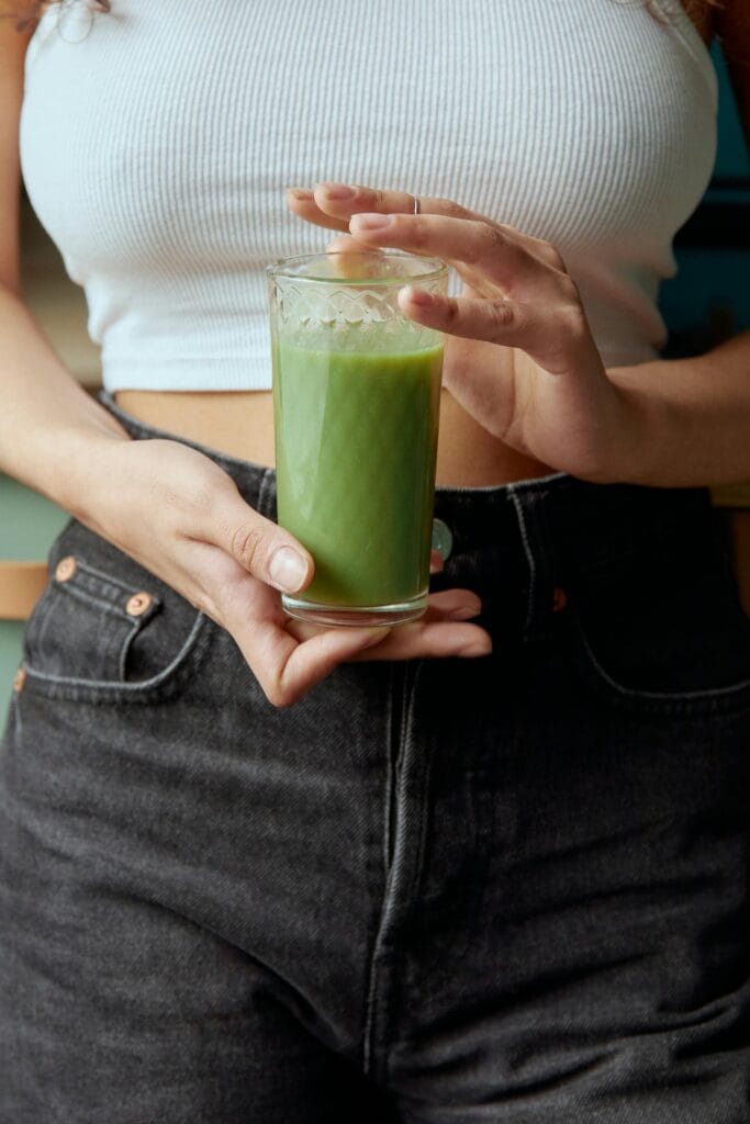 Refreshing glass of Green Detox Juice with natural ingredients